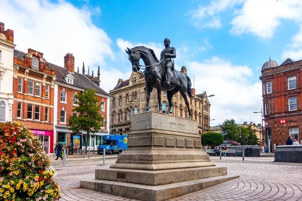 Wolverhampton, UK - August 17 2023: The Bronze sculpture of Prince Albert on horseback, royal consort to Queen Victoria, stands in Queens Square in the the city of Wolverhampton